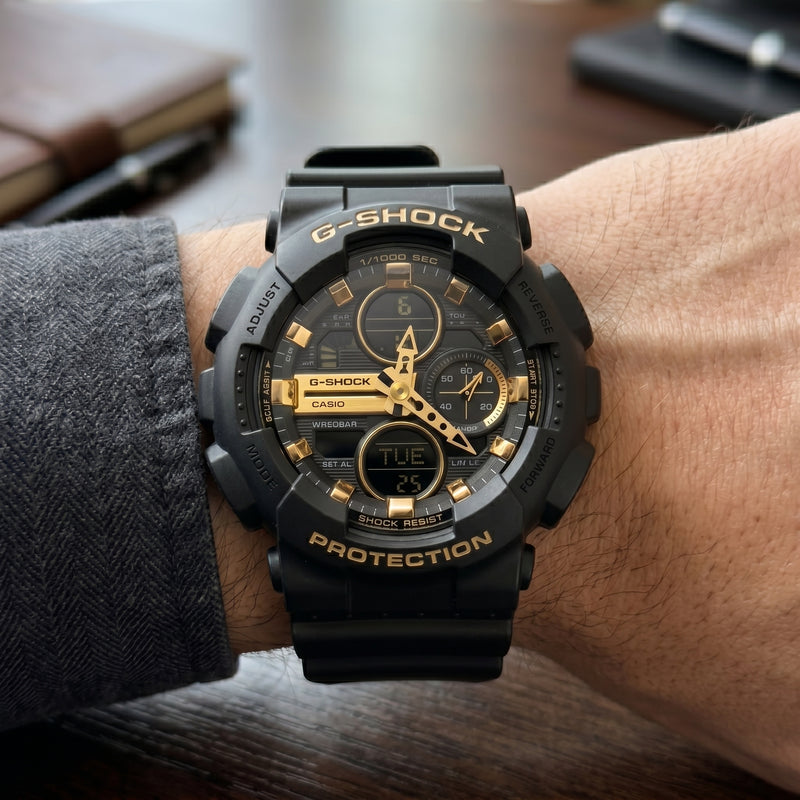 Casio G-Shock GA-100 – Black & Gold Sport Watch