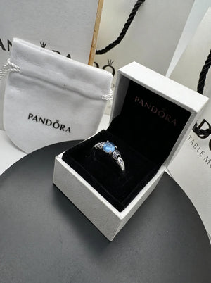 Pandora Celestially Engraved Blue Gemstone Ring - Placing_ring_in_jewelry_box_2K_20261016195554.webp