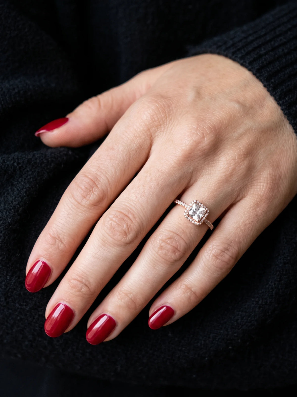 Rose Gold Cushion Cut Square Halo Ring - Woman_wearing_ring_with_manicure_2K_20261016205601.webp