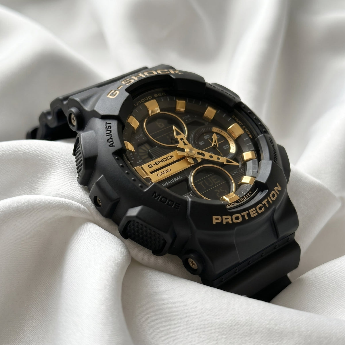 Casio G-Shock GA-100 – Black & Gold Sport Watch - Naggat Silver