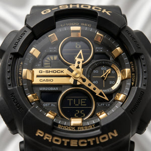 Casio G-Shock GA-100 – Black & Gold Sport Watch - Naggat Silver