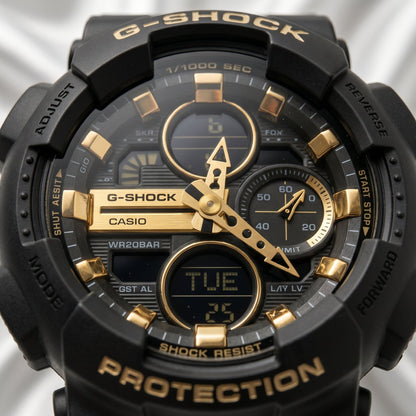 Casio G-Shock GA-100 – Black & Gold Sport Watch - Naggat Silver