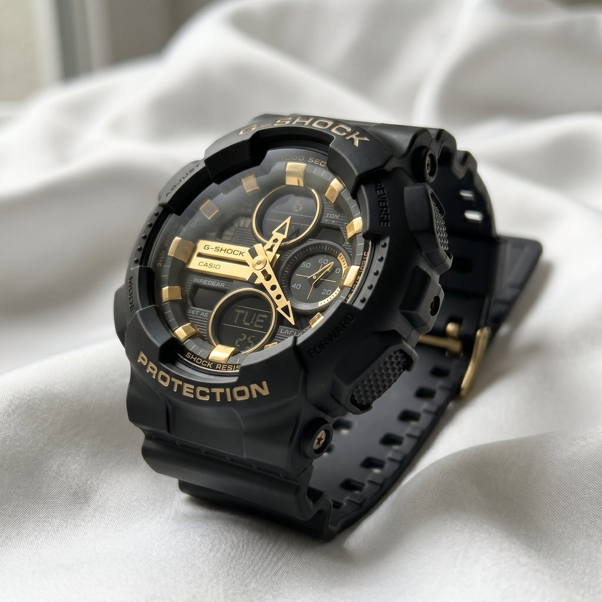 Casio G-Shock GA-100 – Black & Gold Sport Watch - Naggat Silver